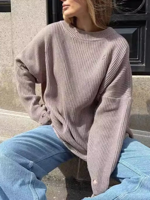 Distressed Round Neck Long Sleeve Sweater                            .